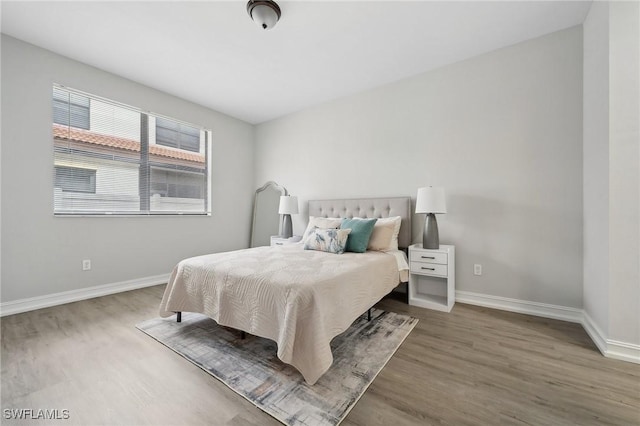 bedroom featuring dark hardwood / wood-style floors