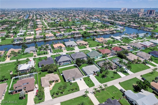 drone / aerial view with a water view