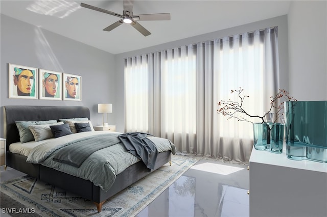 bedroom featuring ceiling fan and multiple windows