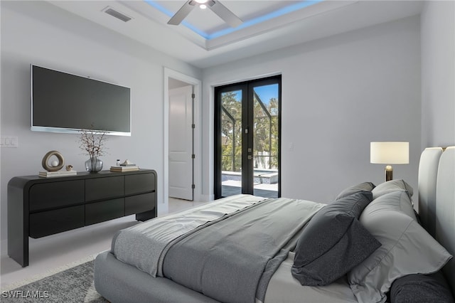 bedroom featuring french doors, access to outside, and ceiling fan