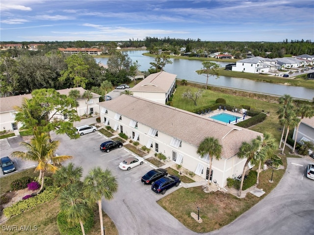 bird's eye view with a water view