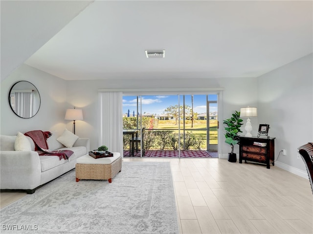 living room featuring light wood-type flooring