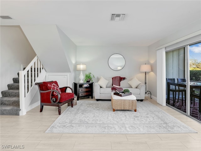 living room with light hardwood / wood-style floors