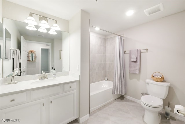 full bathroom featuring toilet, tile patterned floors, shower / bath combo, and vanity