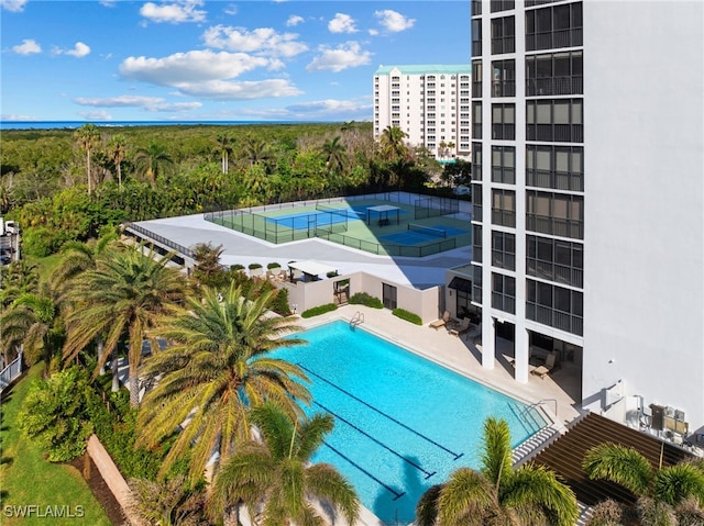 view of swimming pool featuring a patio area