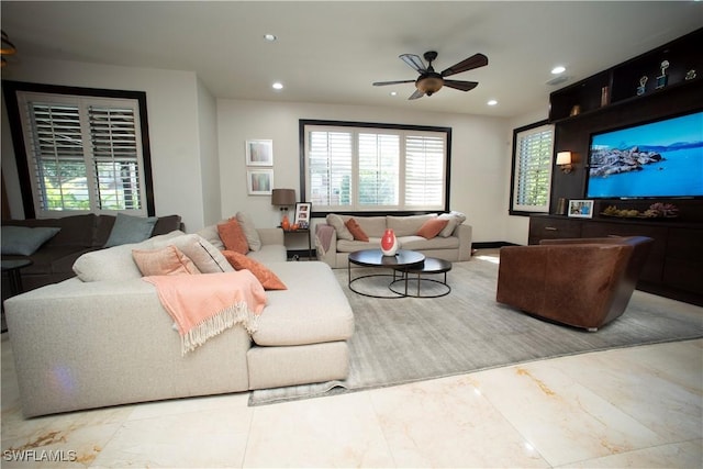 living room featuring ceiling fan