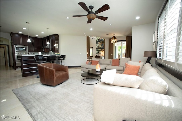 living room with ceiling fan