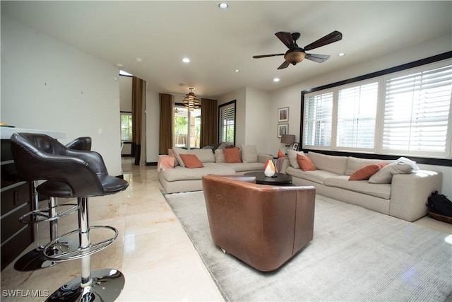 living room featuring ceiling fan