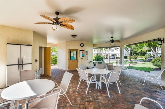 interior space featuring ceiling fan