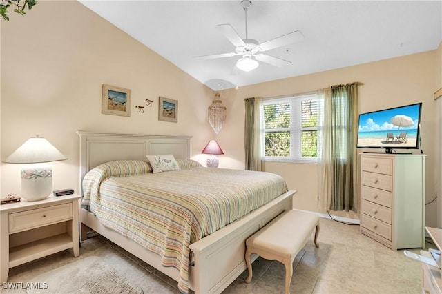 bedroom with ceiling fan and vaulted ceiling