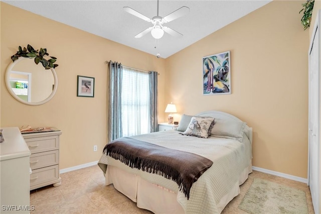 bedroom with vaulted ceiling and ceiling fan