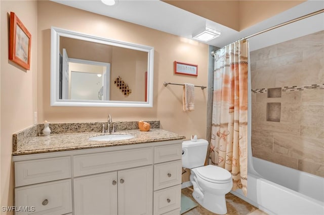 full bathroom with shower / tub combo, vanity, and toilet