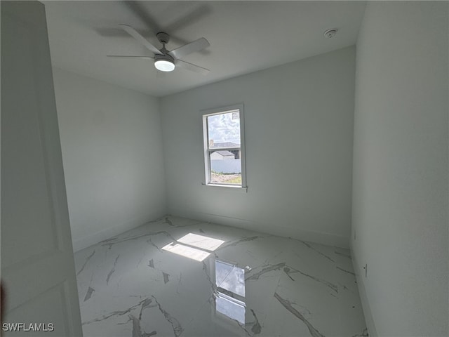 unfurnished room with ceiling fan