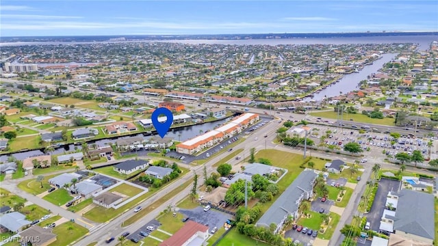 bird's eye view with a water view