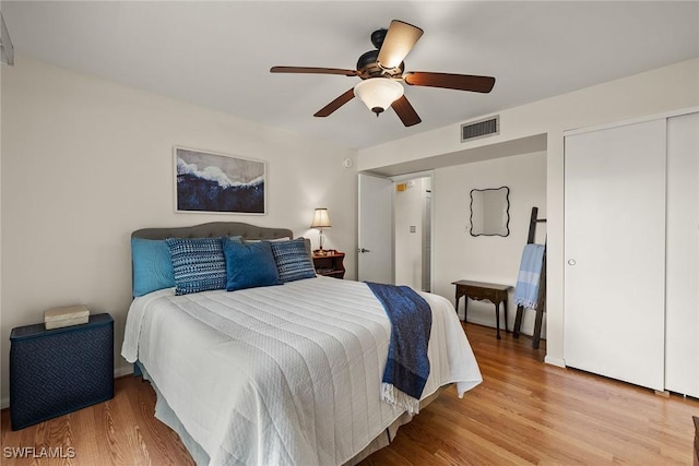 bedroom featuring ceiling fan and light wood-type flooring