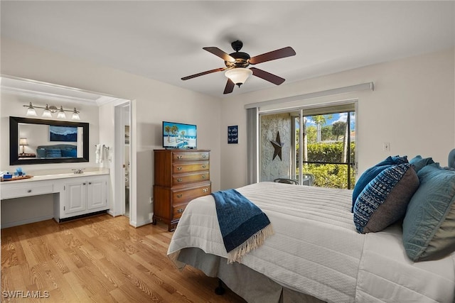 bedroom with access to outside, ensuite bathroom, light hardwood / wood-style flooring, ceiling fan, and built in desk