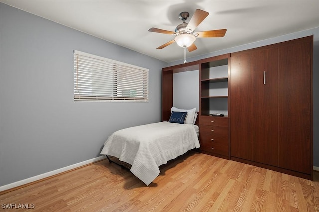 bedroom featuring ceiling fan and light wood-type flooring