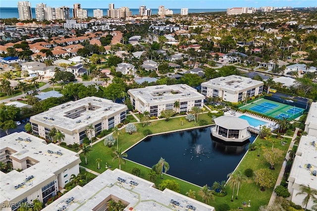 birds eye view of property featuring a water view