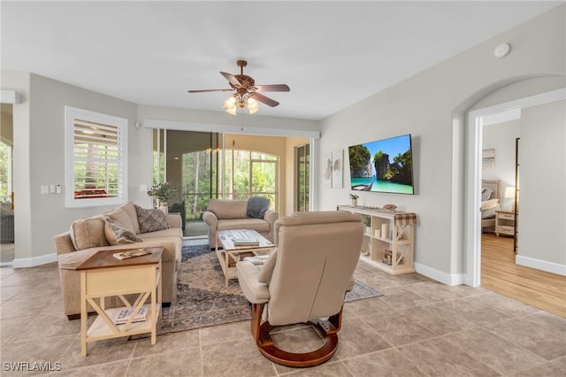 living room with ceiling fan