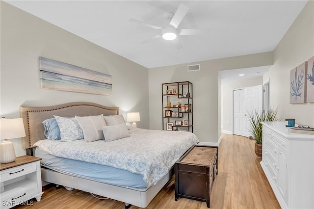 bedroom featuring ceiling fan and light wood-type flooring