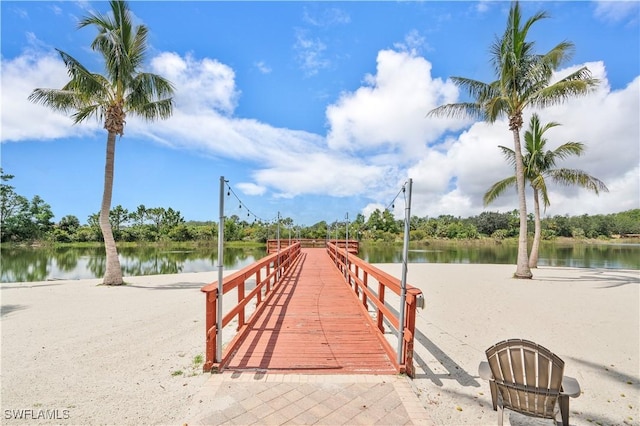 surrounding community featuring a water view