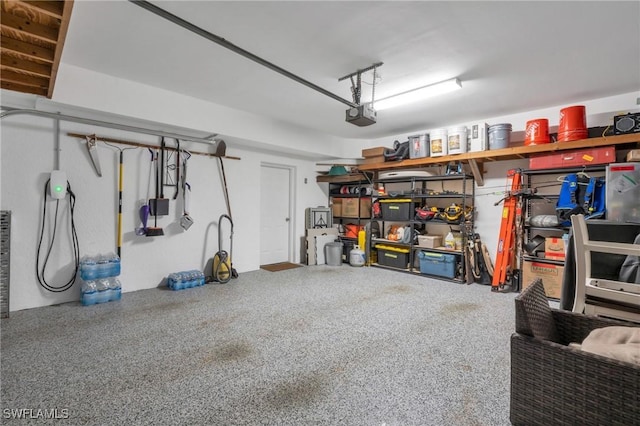 garage featuring a garage door opener