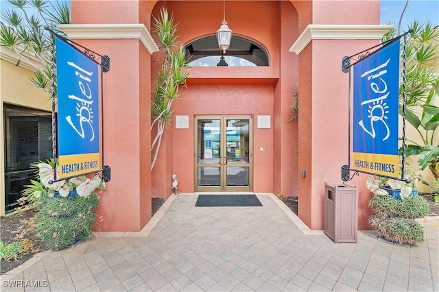 doorway to property featuring french doors