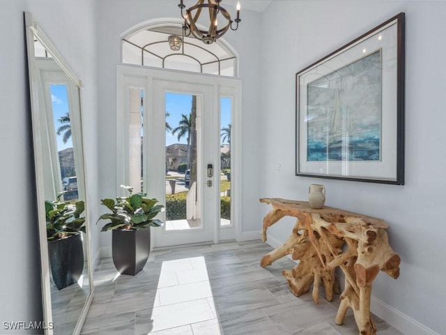 doorway with an inviting chandelier