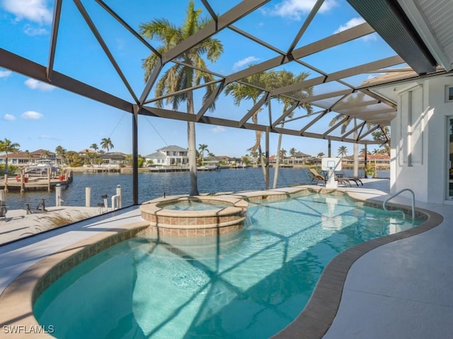 view of pool with an in ground hot tub, a water view, a dock, and a lanai