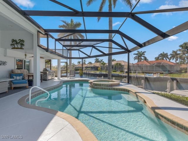 view of swimming pool with grilling area, a lanai, an in ground hot tub, area for grilling, and a patio