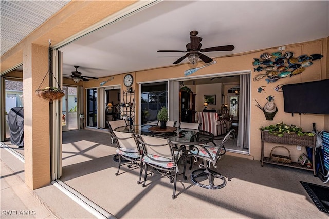 view of patio with ceiling fan