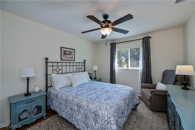 bedroom featuring ceiling fan