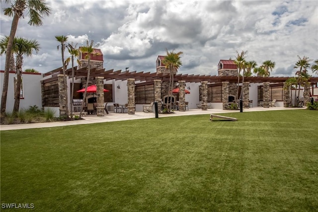 exterior space featuring a pergola and a patio