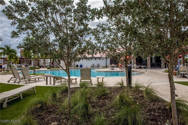 pool with a patio