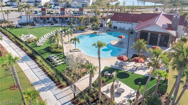 community pool with a patio area