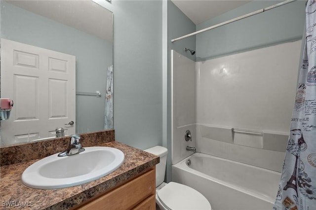 full bathroom featuring vanity, shower / bath combo, and toilet