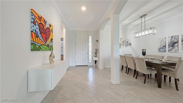 interior space with crown molding