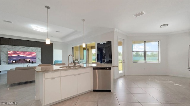 kitchen with light stone counters, dishwasher, decorative light fixtures, white cabinetry, and sink