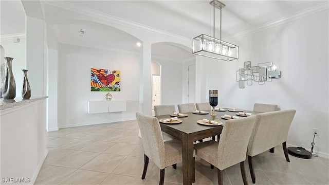 tiled dining room with crown molding