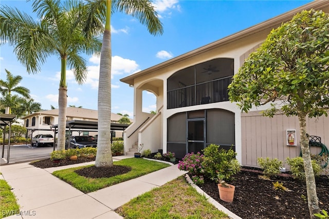 view of property featuring a carport