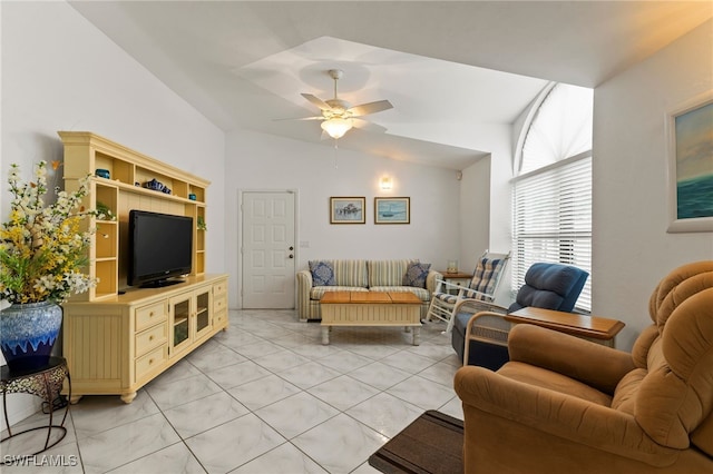 tiled living room featuring vaulted ceiling and ceiling fan