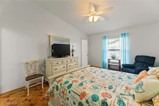 bedroom with ceiling fan, parquet floors, and lofted ceiling