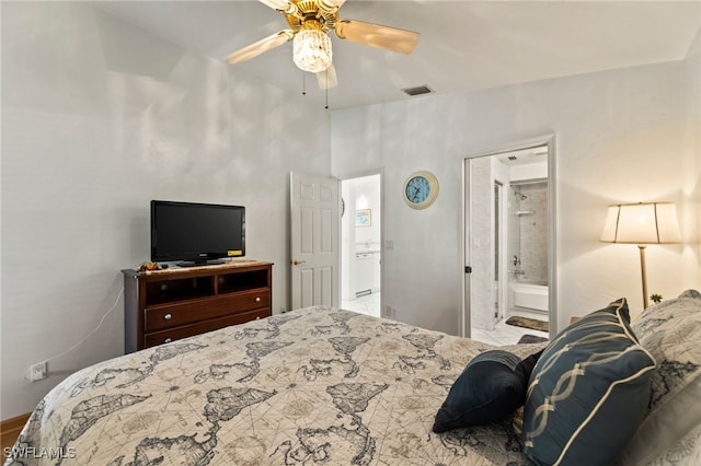 bedroom featuring ceiling fan and ensuite bath