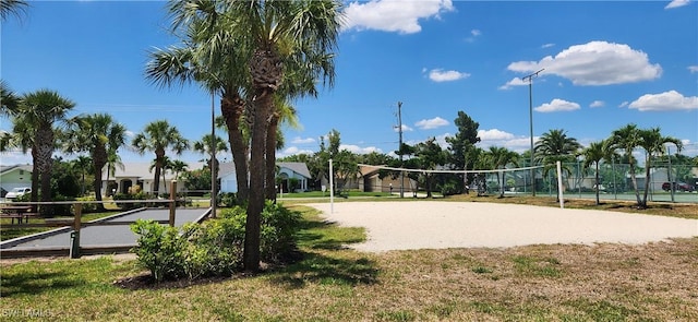 view of home's community featuring volleyball court