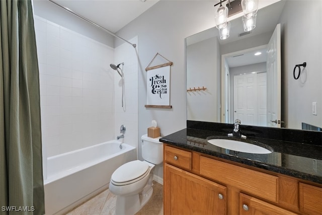 full bathroom featuring toilet, vanity, tile patterned floors, and shower / bathtub combination with curtain