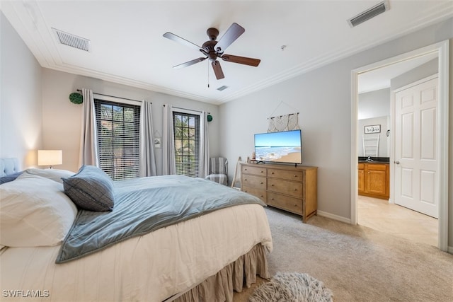 bedroom with crown molding, light colored carpet, visible vents, and ceiling fan