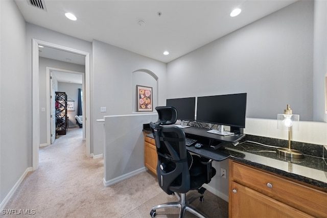 home office featuring baseboards, recessed lighting, visible vents, and light carpet