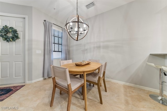 dining room featuring light tile patterned flooring, baseboards, visible vents, and a chandelier