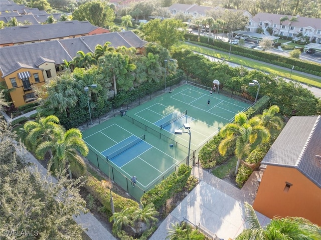 birds eye view of property with a residential view