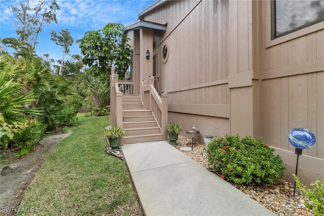 view of home's exterior with a yard